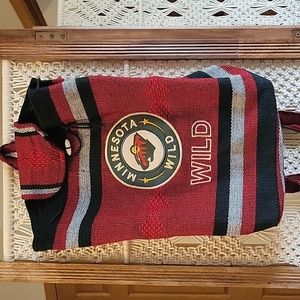 Minnesota Wild Backpack. Woven Fabric. Length 16" Width 14". Drawstring For Top.